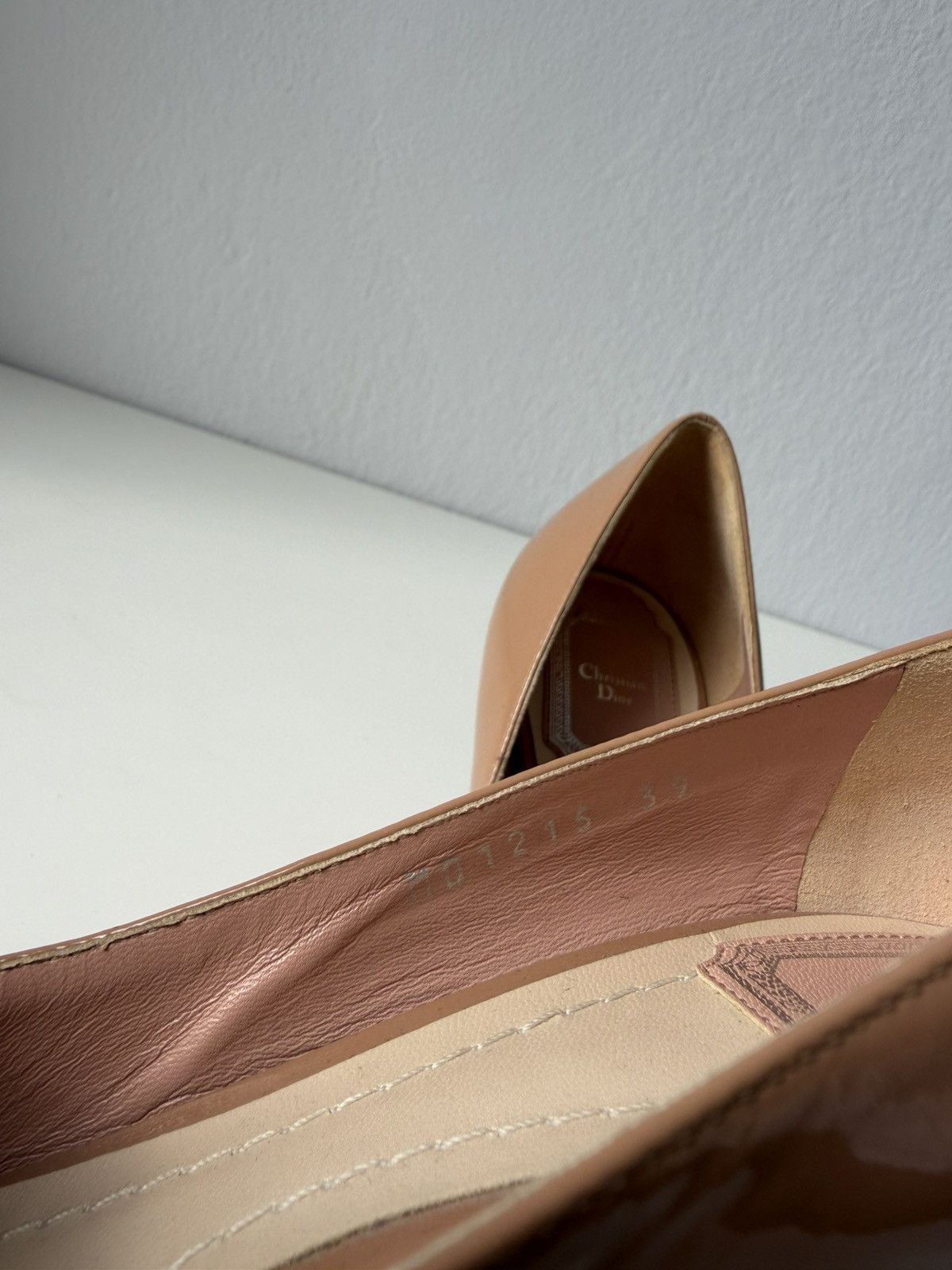 Dior patent leather buckled pointed toe pumps with bow