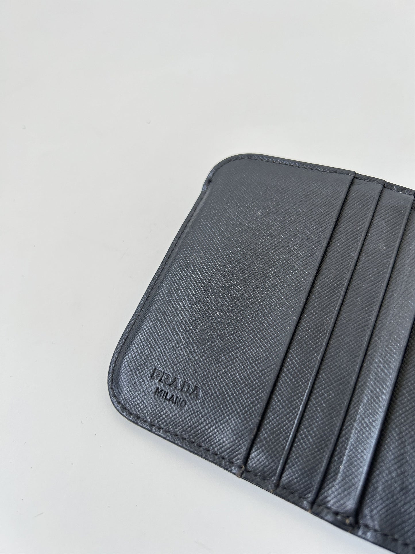 Prada nylon and saffiano leather triangle logo zip wallet