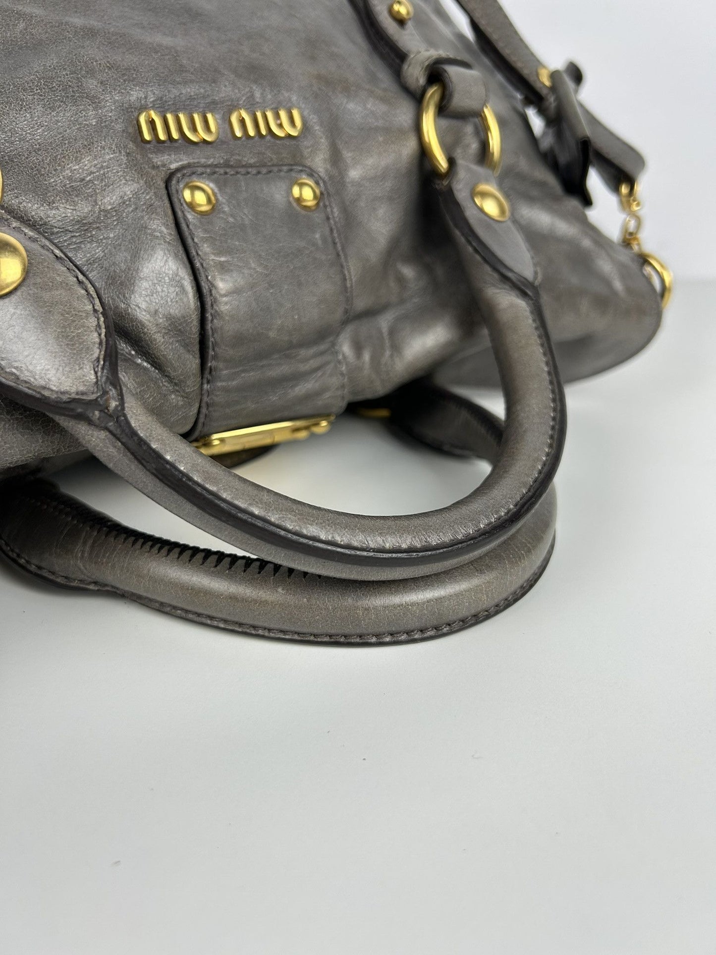 Miu miu vitello bow bag in gray with locket