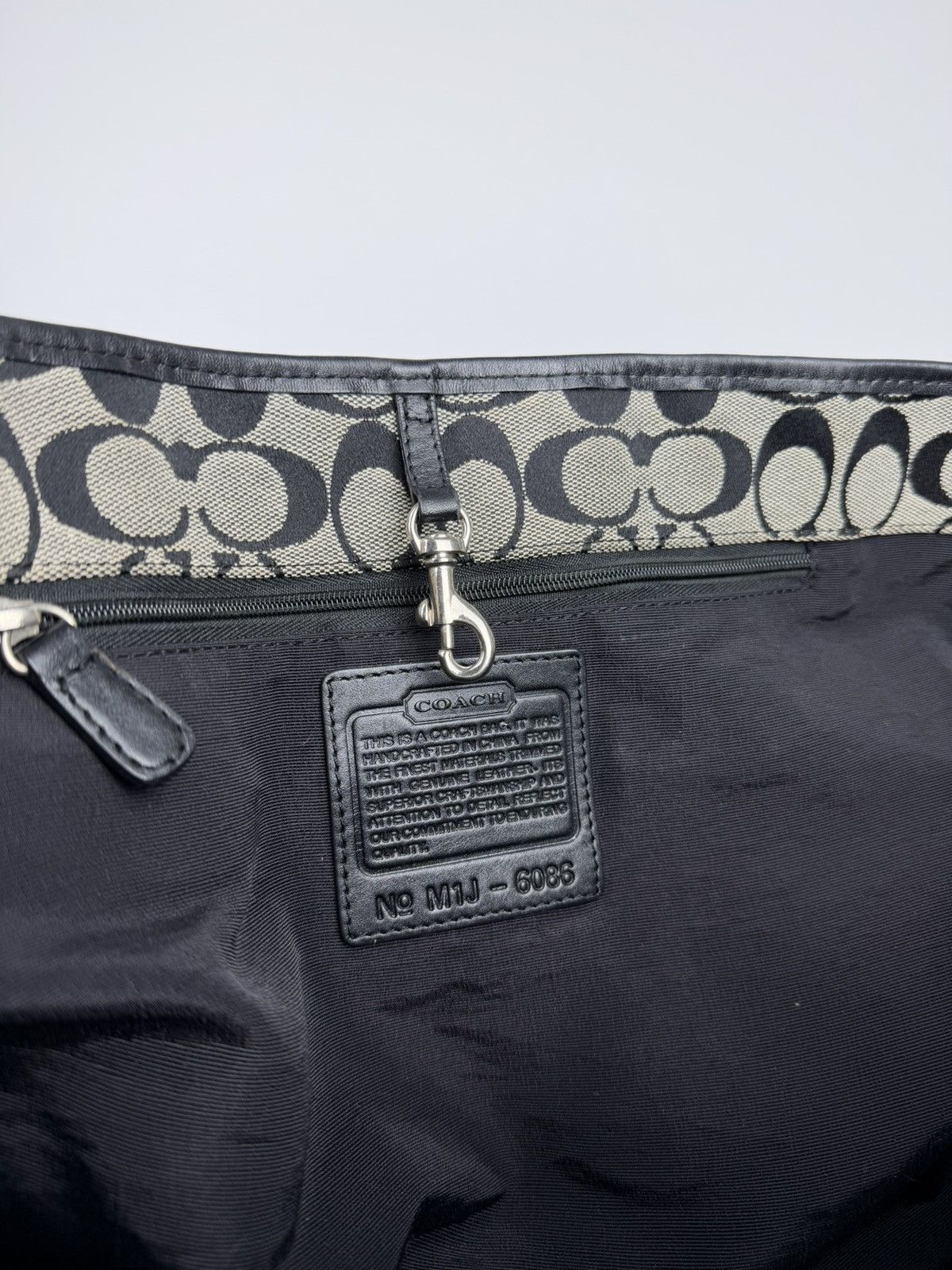 Coach signature leather and canvas tote bag