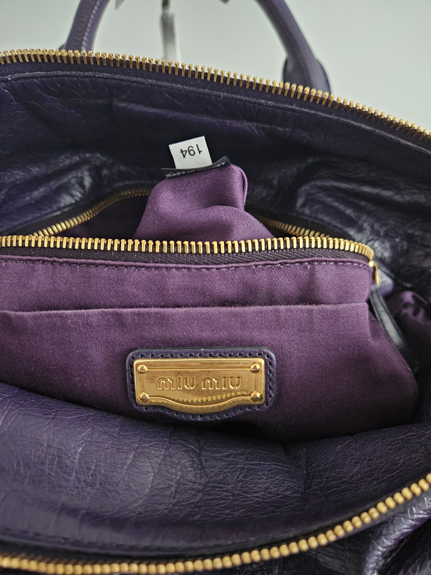Miu miu vitello bow bag in deep purple