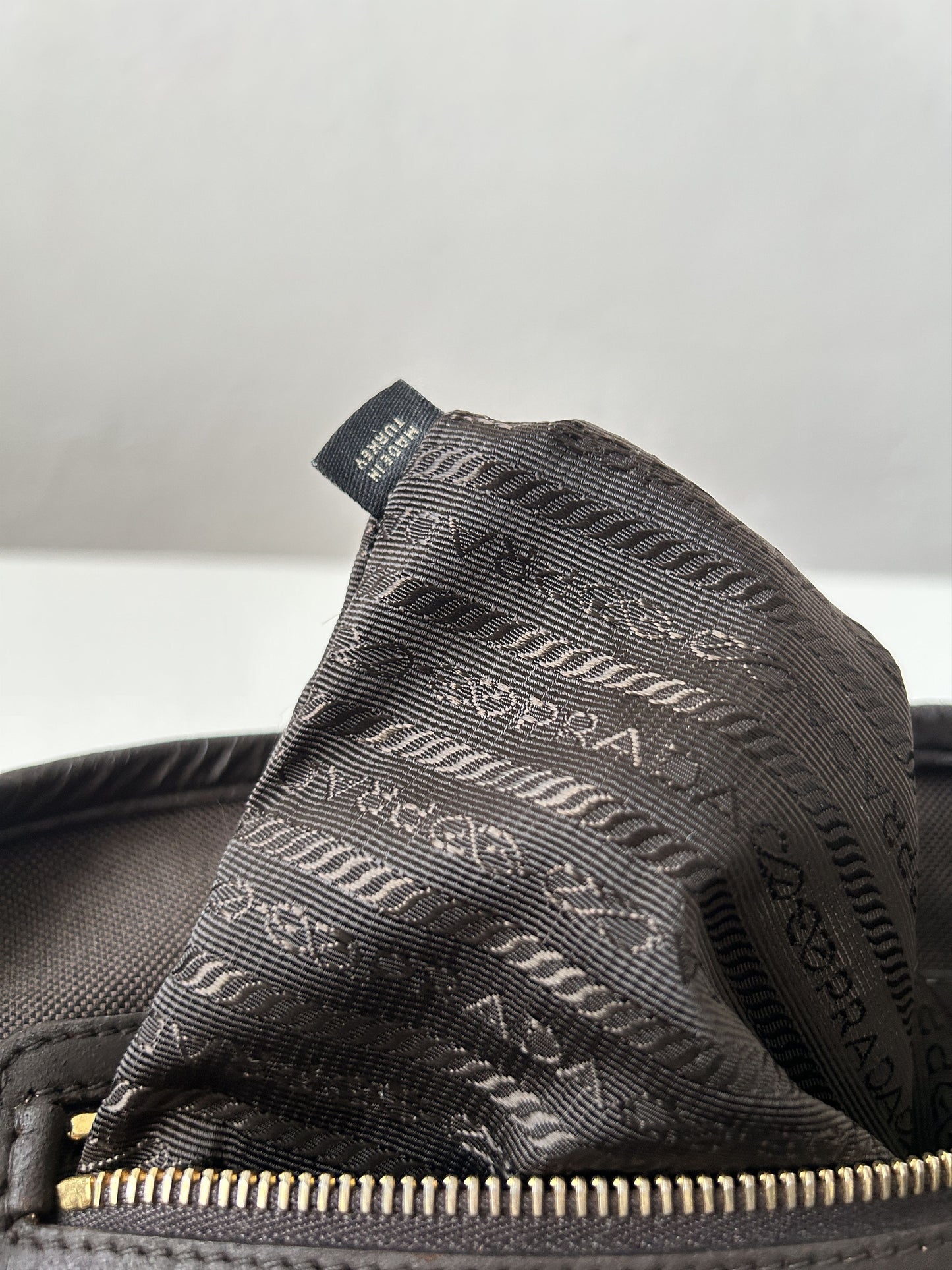 Prada canvas and leather triangle logo tote bag