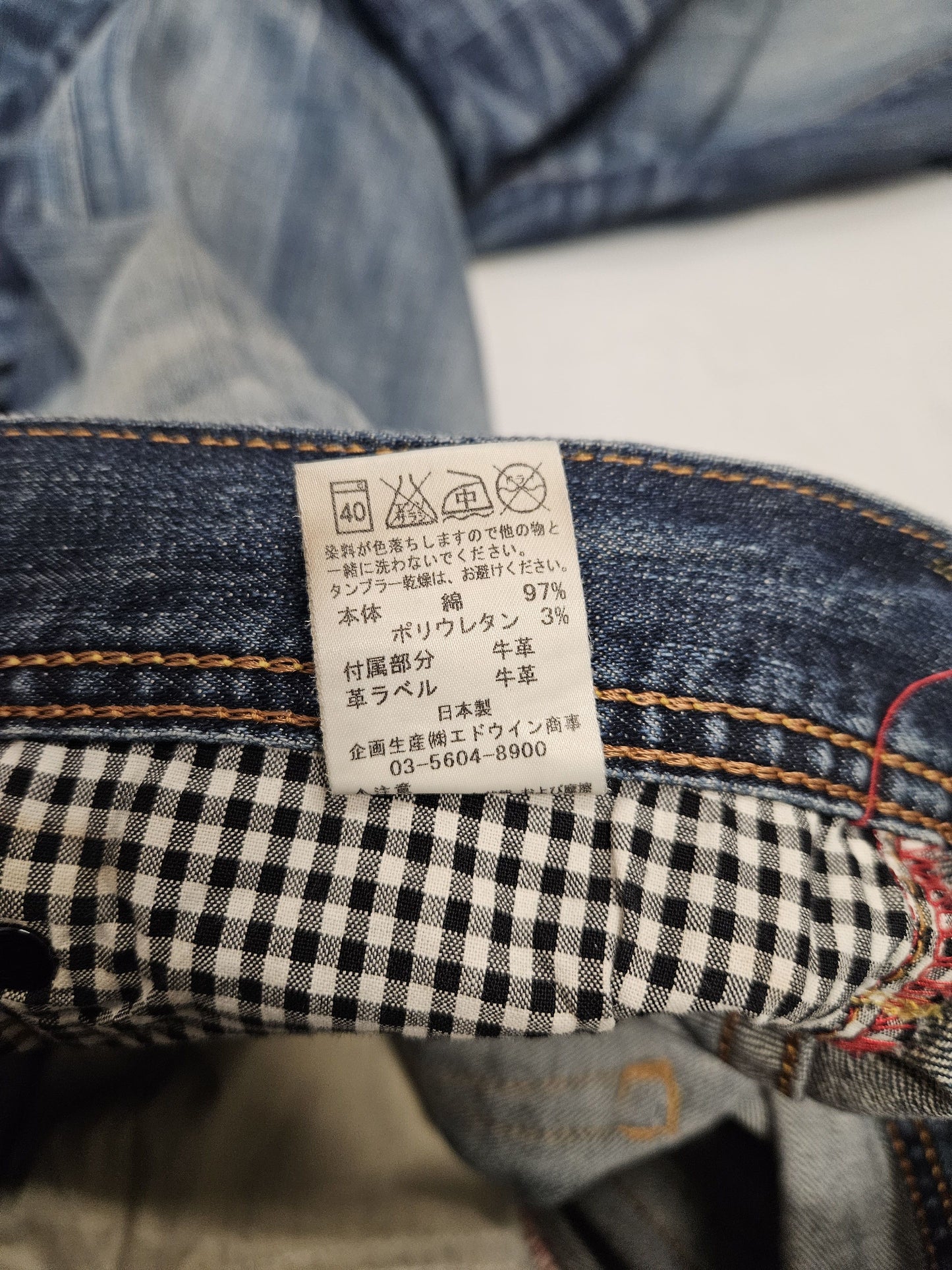 Edwin blue trip distressed washed bootcut denim