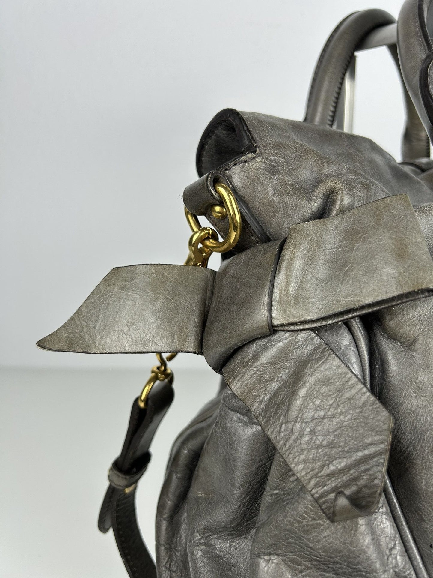 Miu miu vitello bow bag in gray with locket