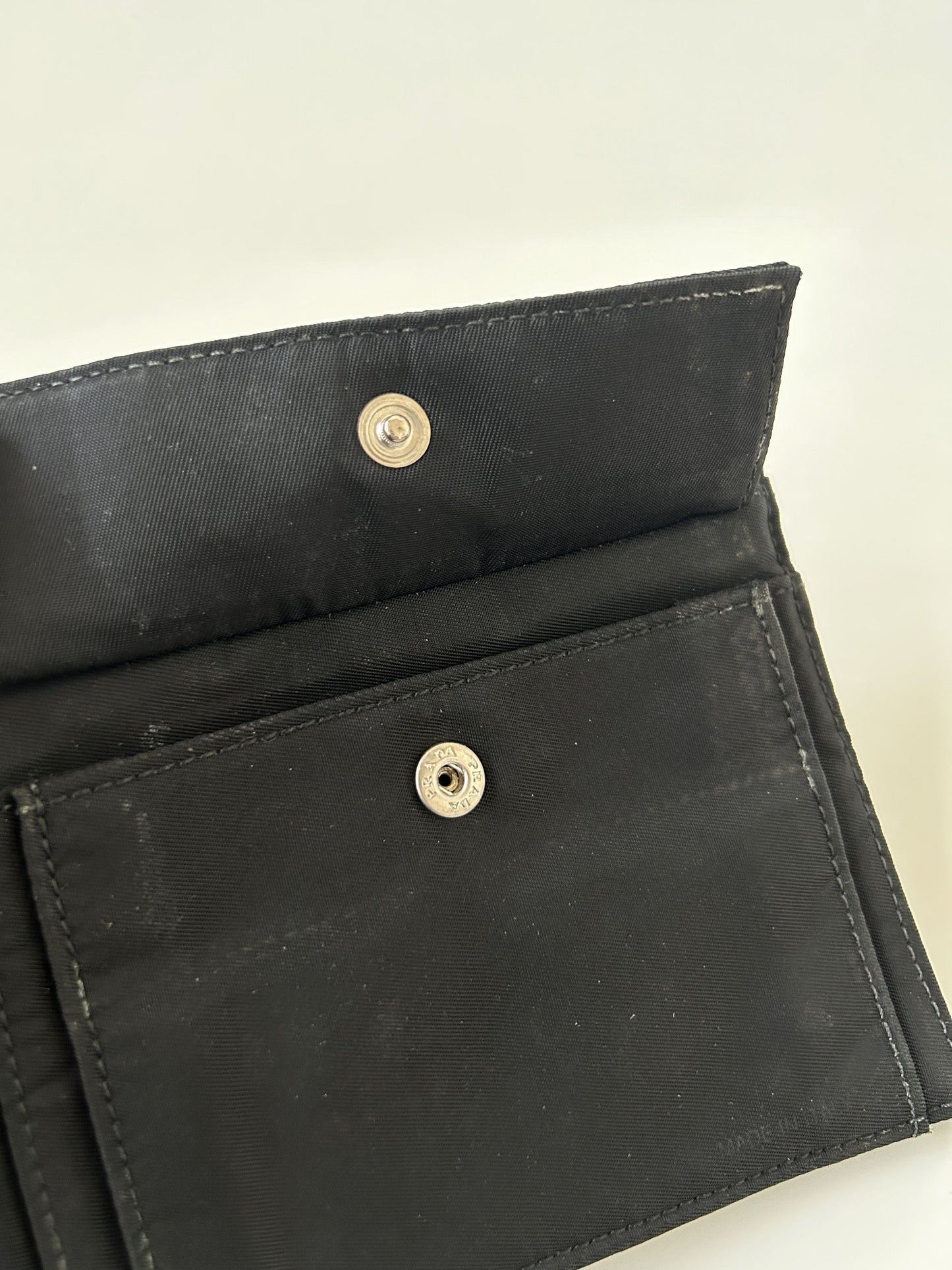 Prada triangle logo nylon bifold wallet