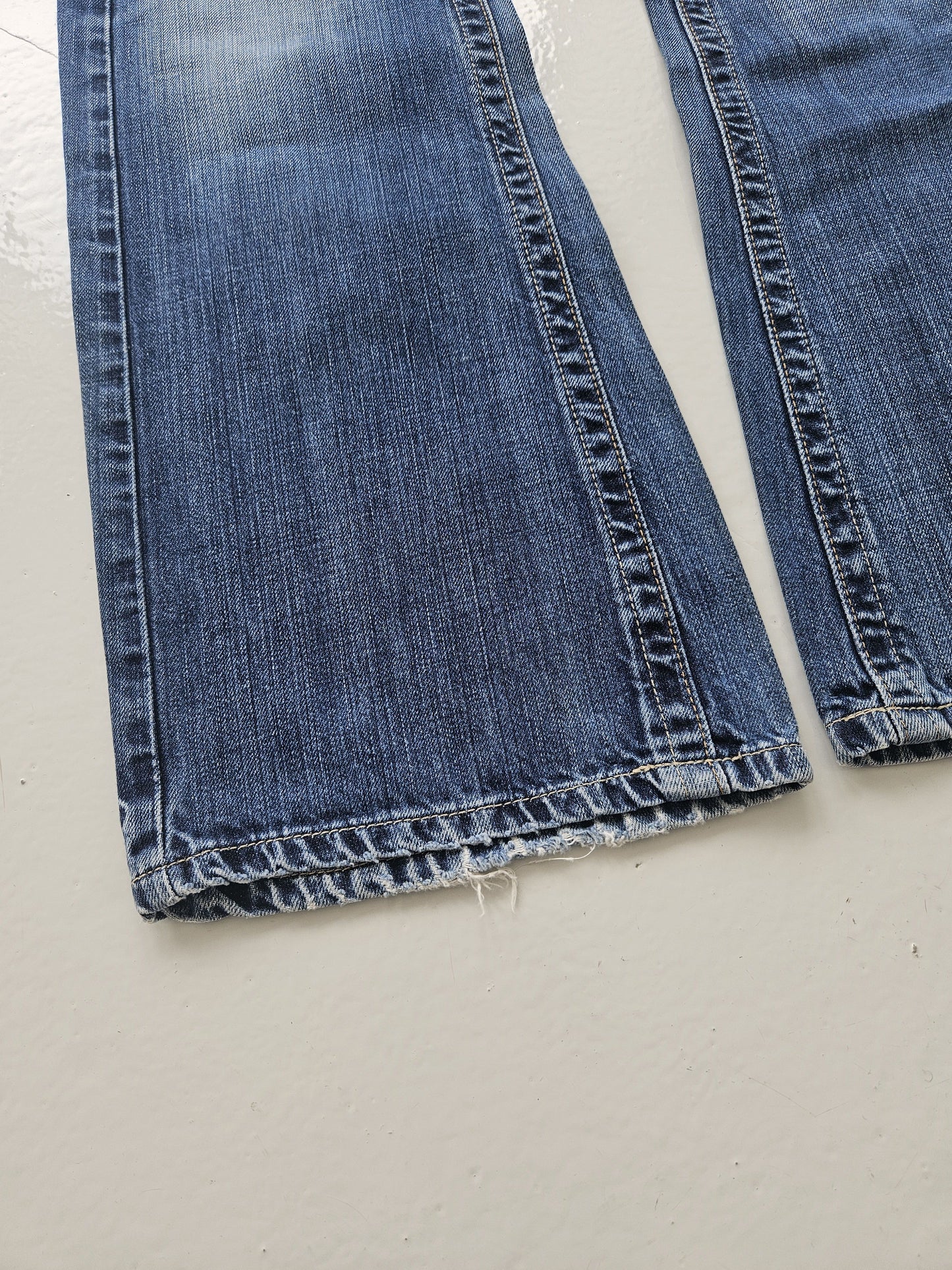 Vintage distressed bootcut low waisted denim