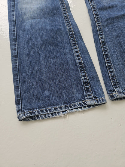 Vintage distressed bootcut low waisted denim