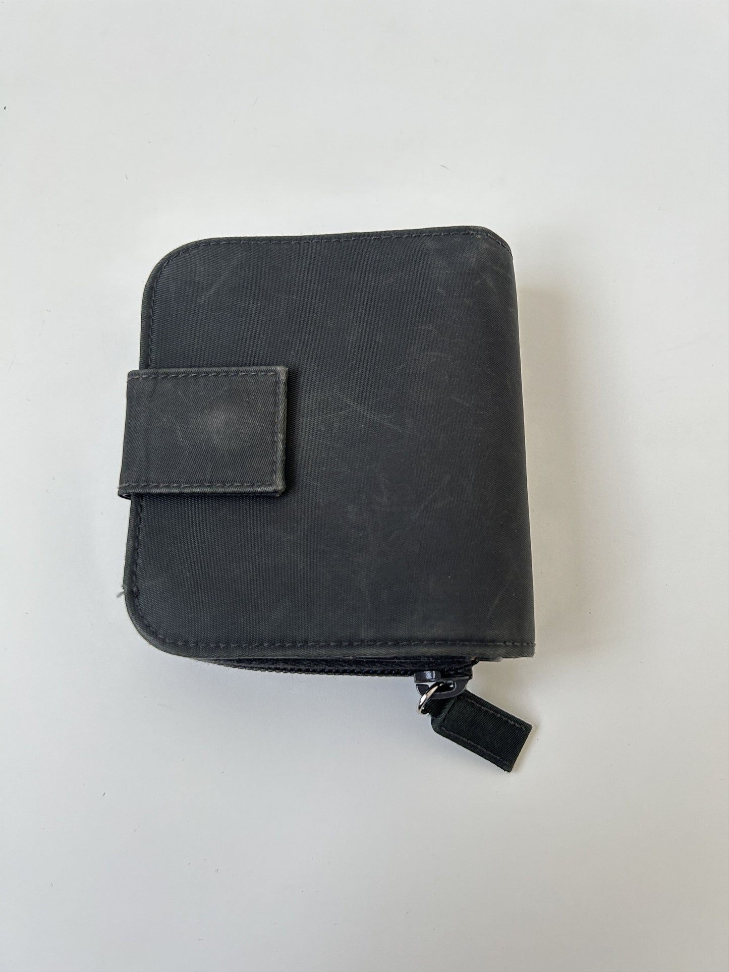 Prada nylon and saffiano leather triangle logo zip wallet