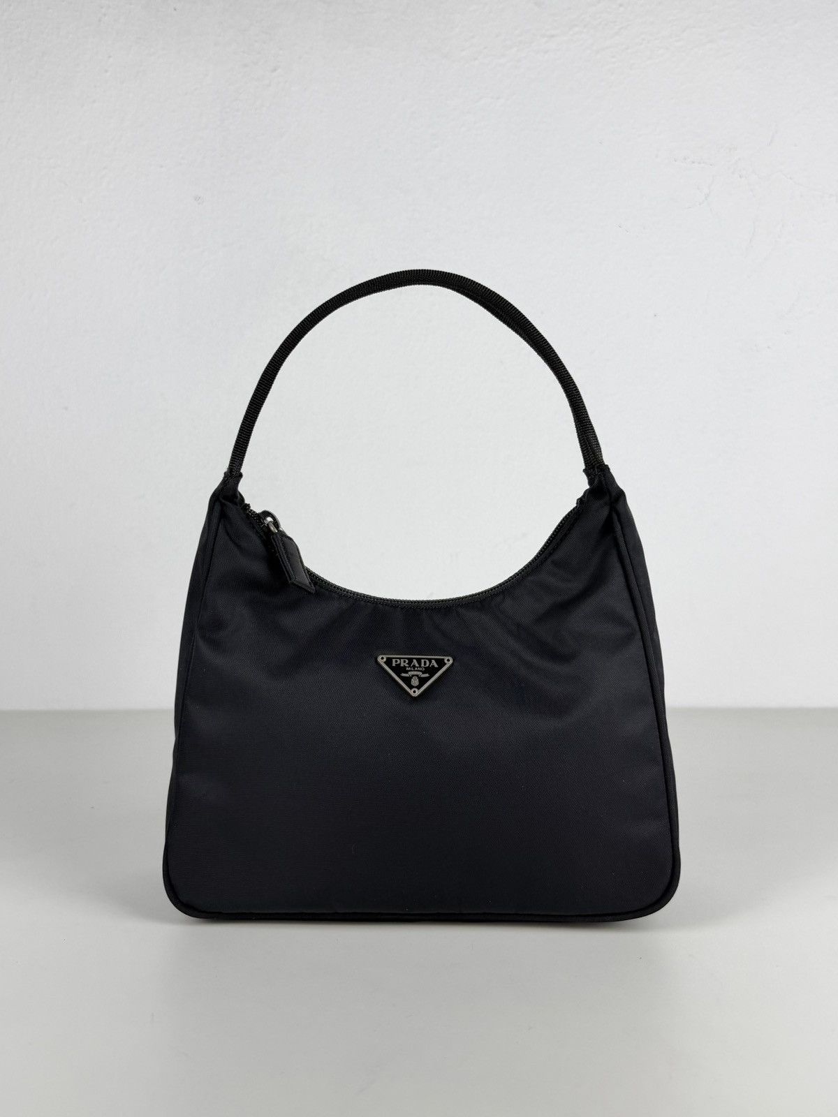 Vintage prada tessuto nylon triangle logo mini hobo bag