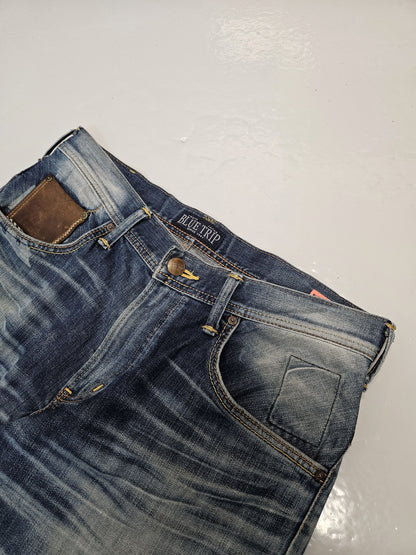 Edwin blue trip distressed washed bootcut denim