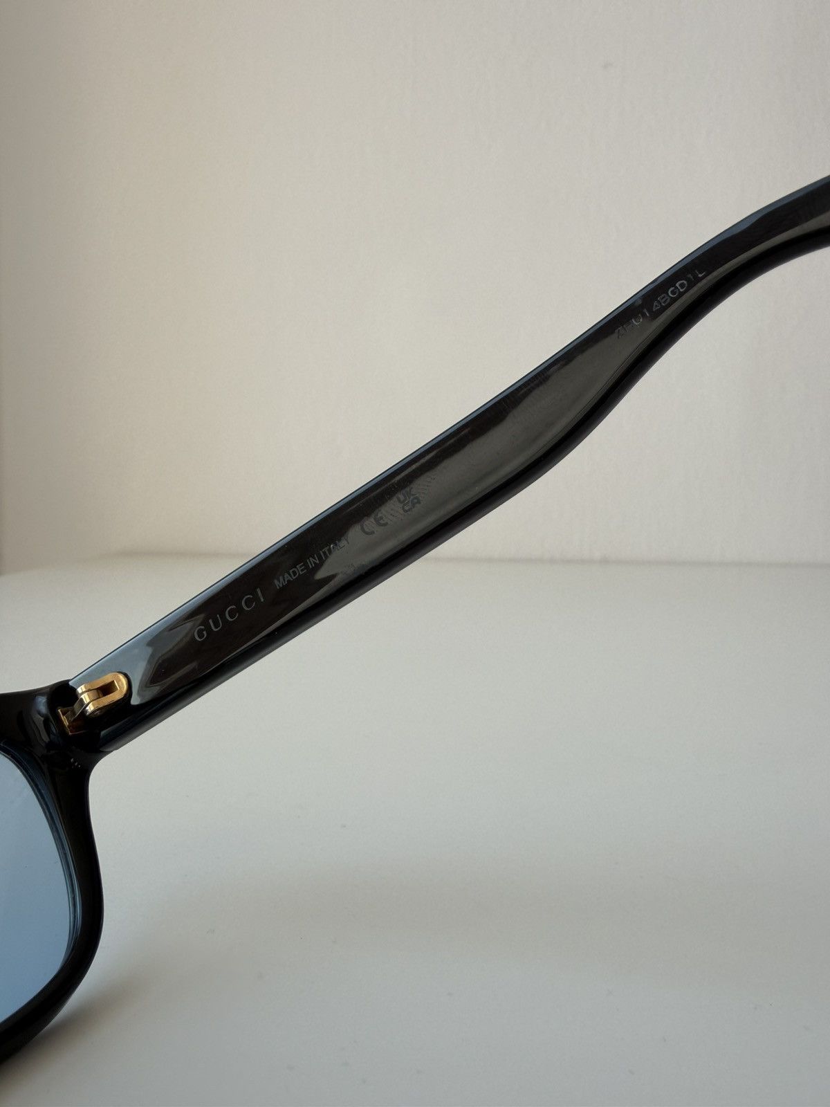Gucci GG1341O sunglasses with blue tint lenses