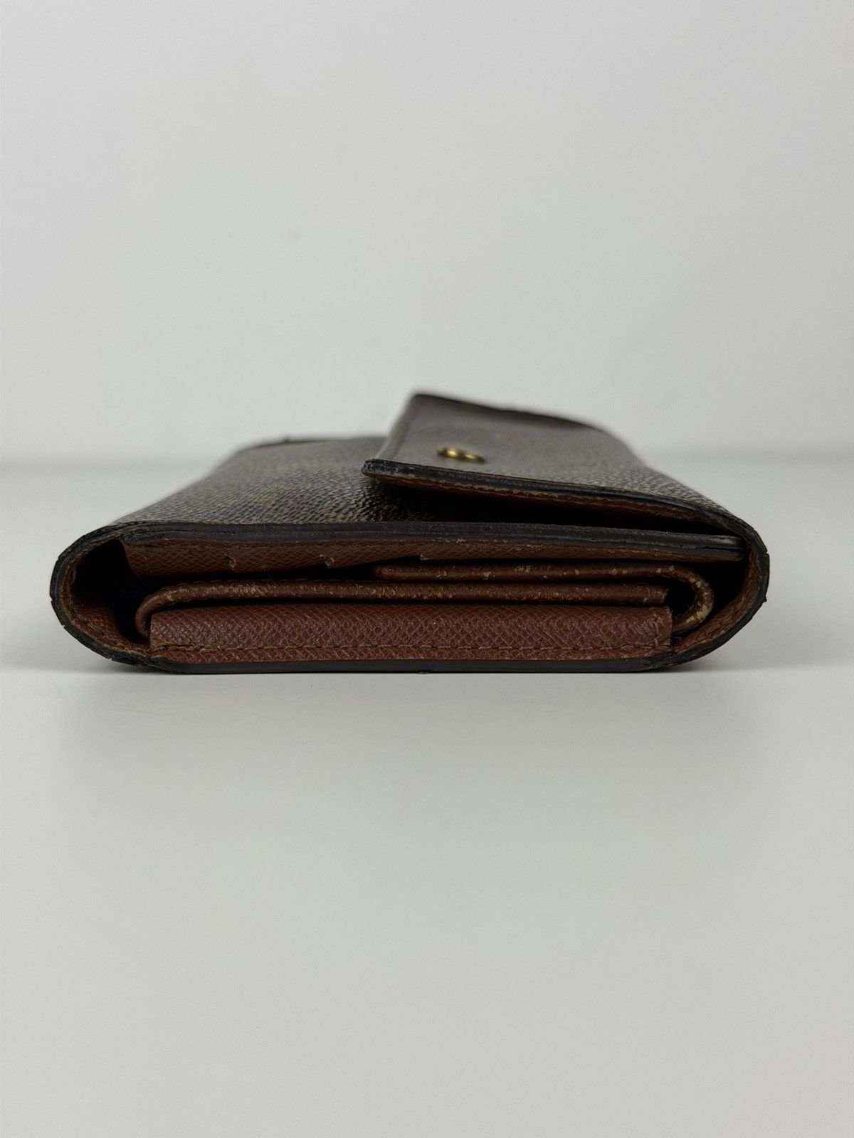 Louis Vuitton porto tresor international trifold wallet