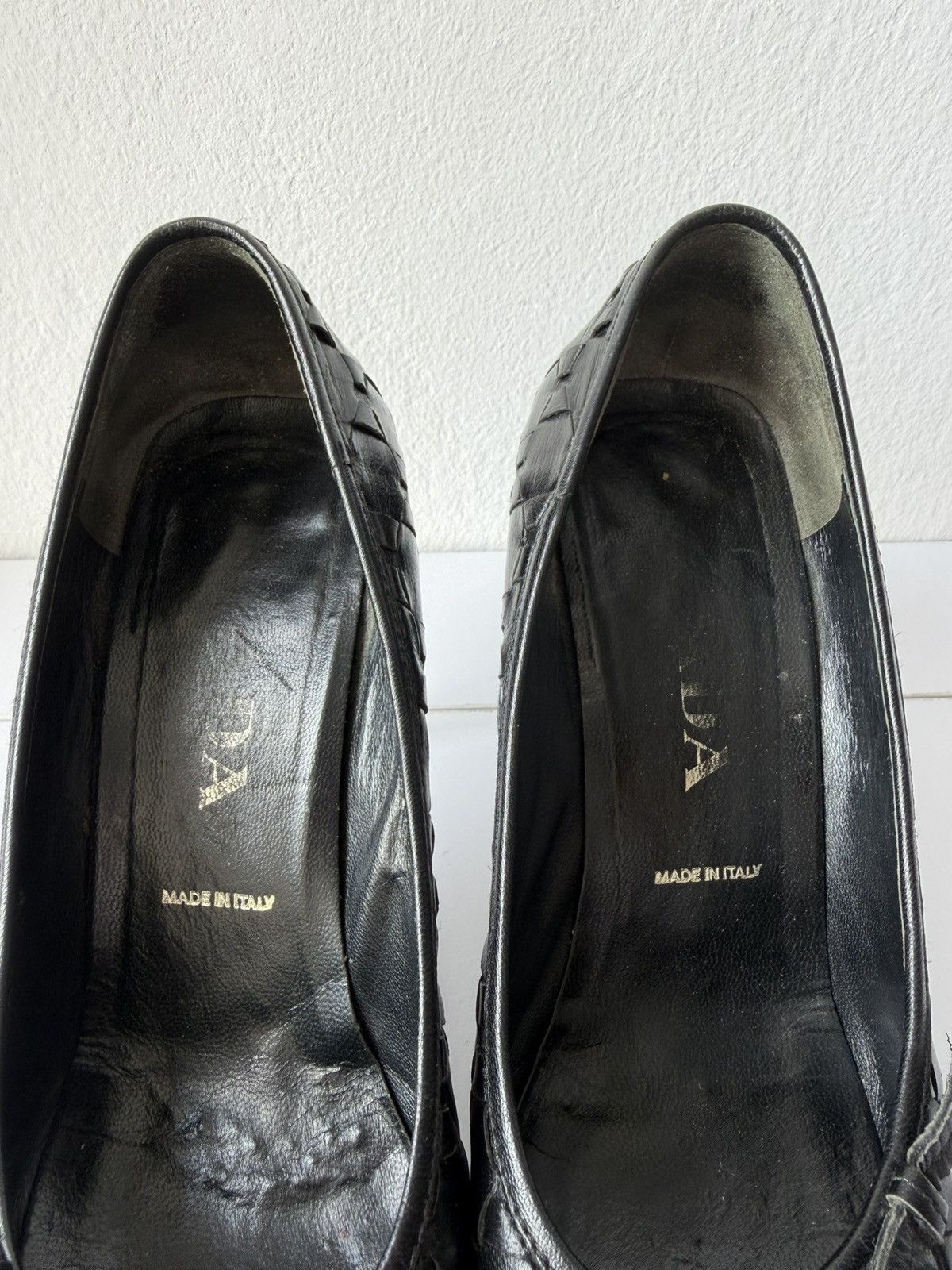 Prada woven leather long toe pumps with bow