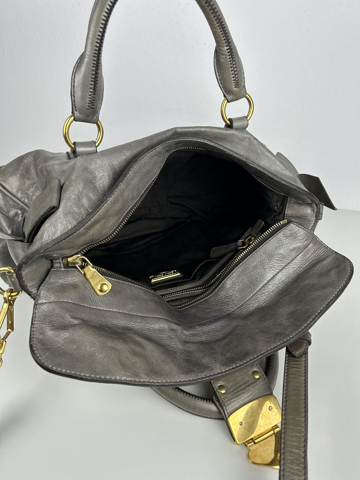 Miu miu vitello bow bag in gray with locket