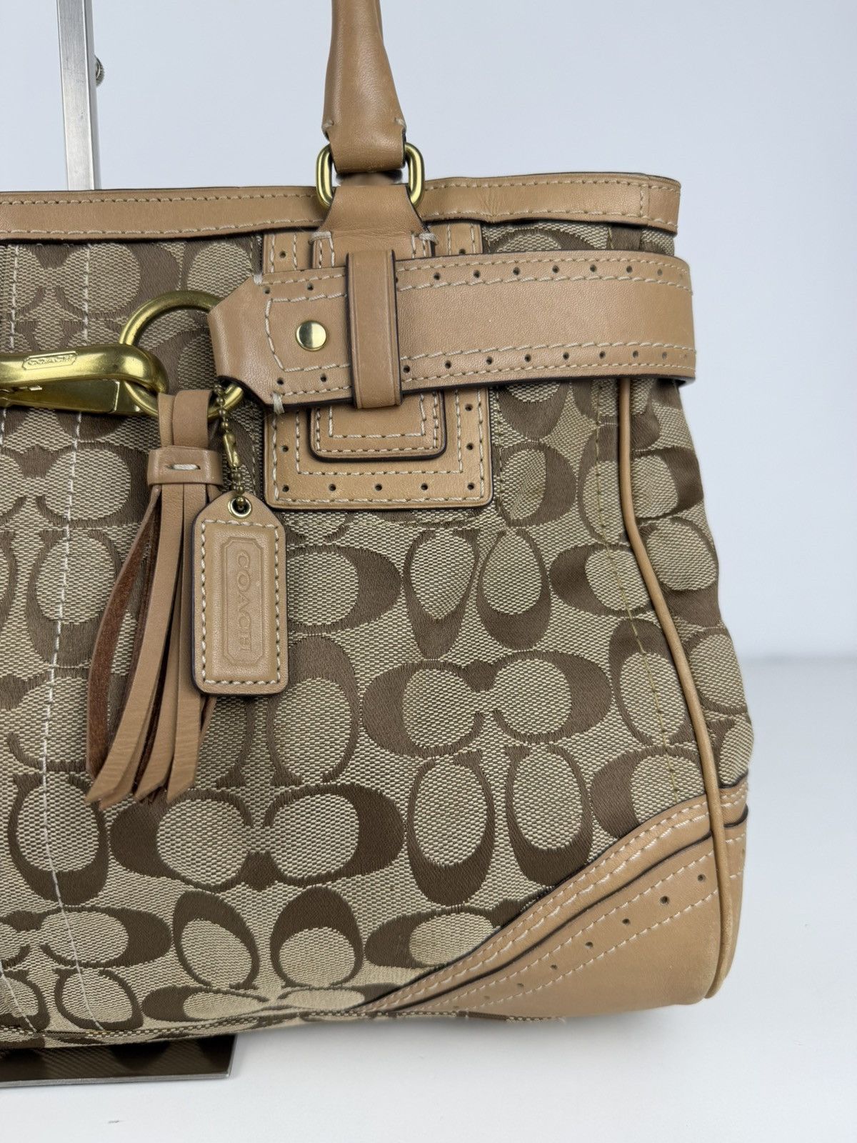 Coach signature leather canvas tassel tote bag