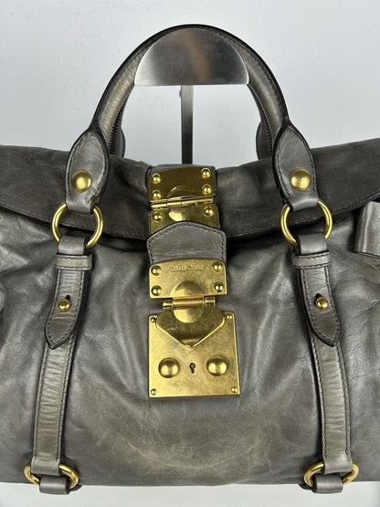 Miu miu vitello bow bag in gray with locket