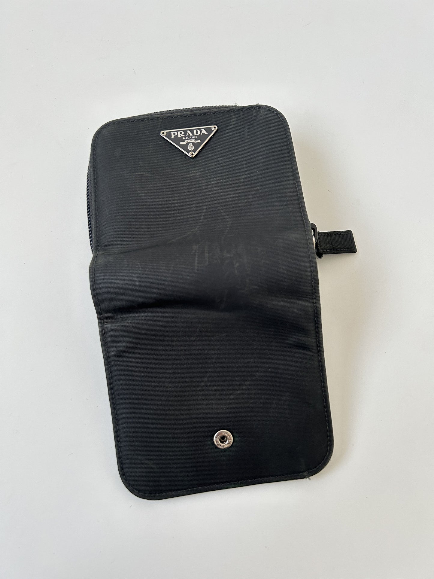 Prada nylon and saffiano leather triangle logo zip wallet