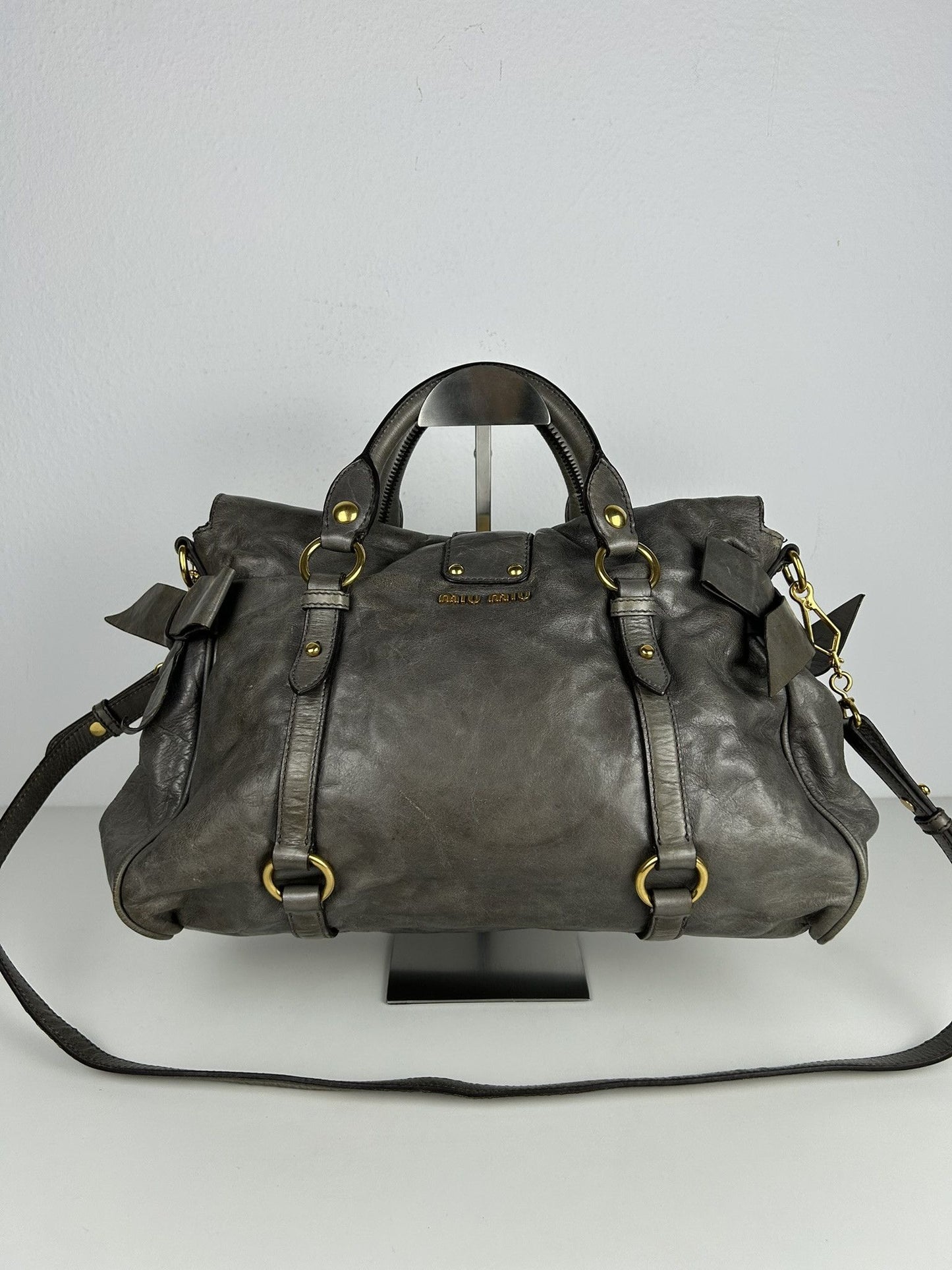 Miu miu vitello bow bag in gray with locket