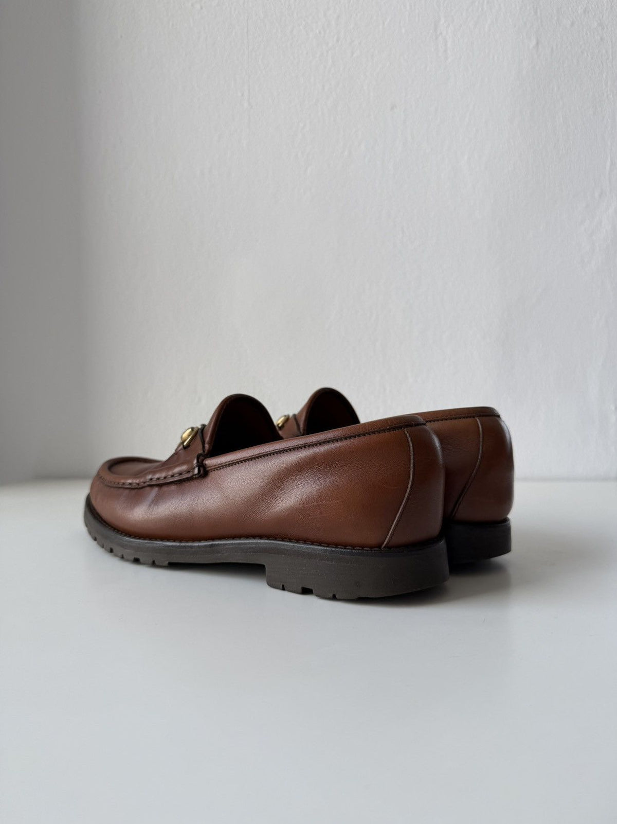 Gucci leather horsebit loafers on a thick notched sole