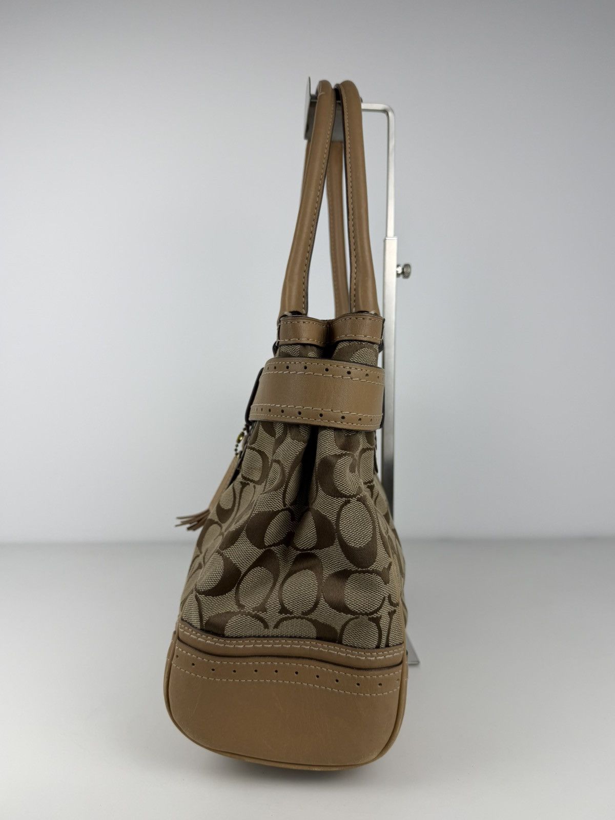 Coach signature leather canvas tassel tote bag