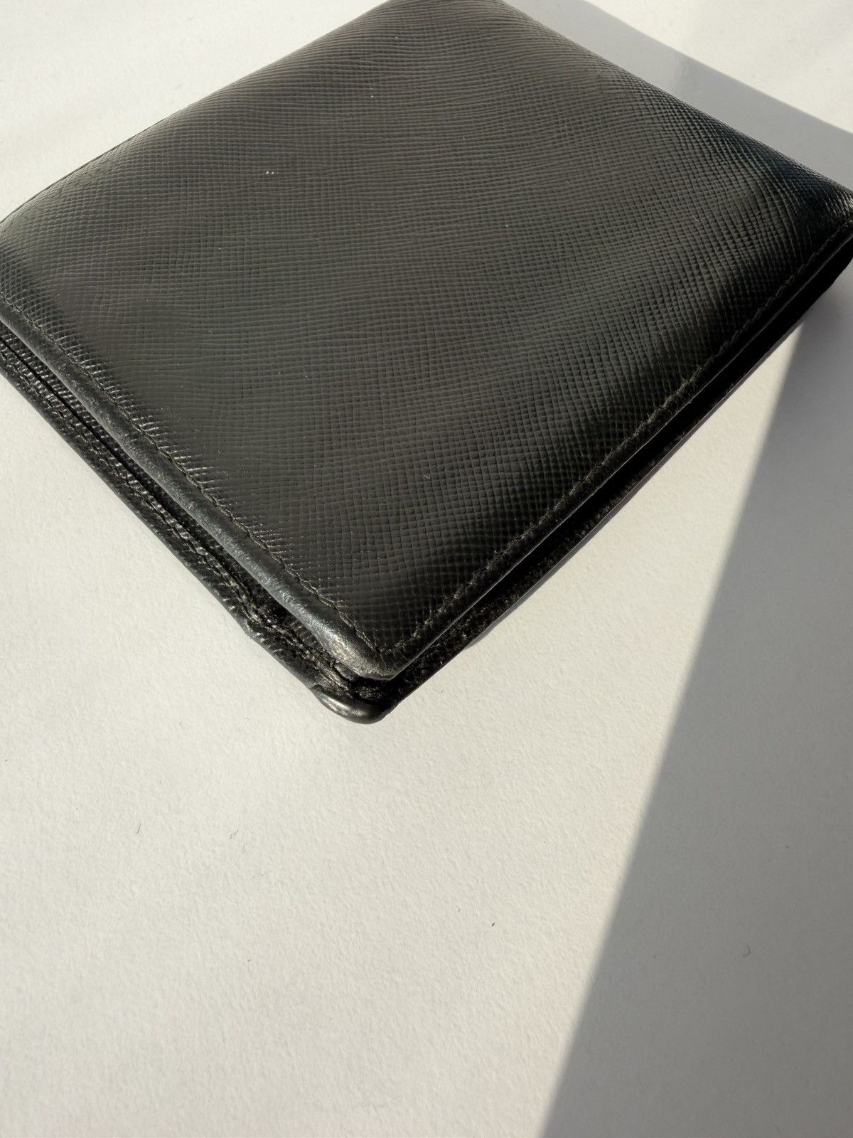 Prada saffiano leather bifold wallet