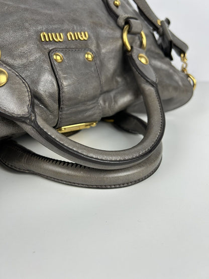 Miu miu vitello bow bag in gray with locket