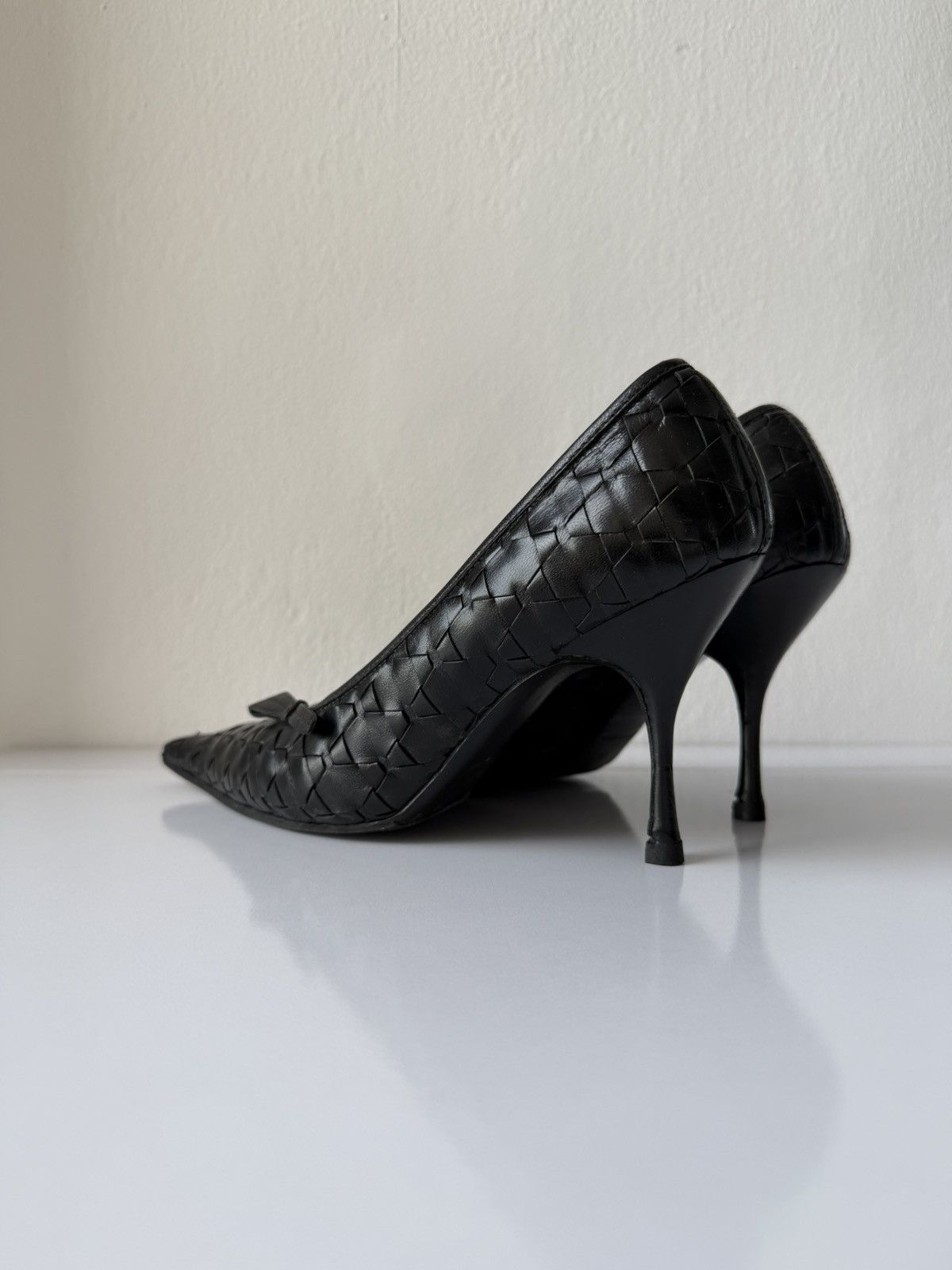 Prada woven leather long toe pumps with bow