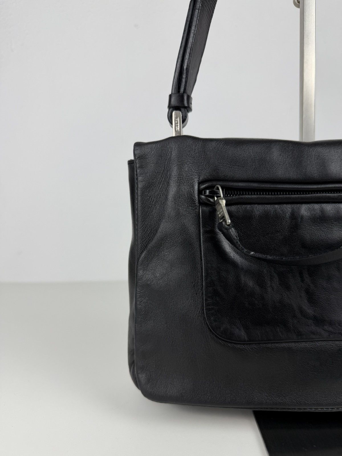 Vintage Prada embossed logo leather shoulder bag