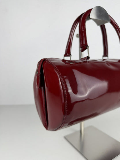 Vintage 90s Miu Miu patent leather cylindrical handbag