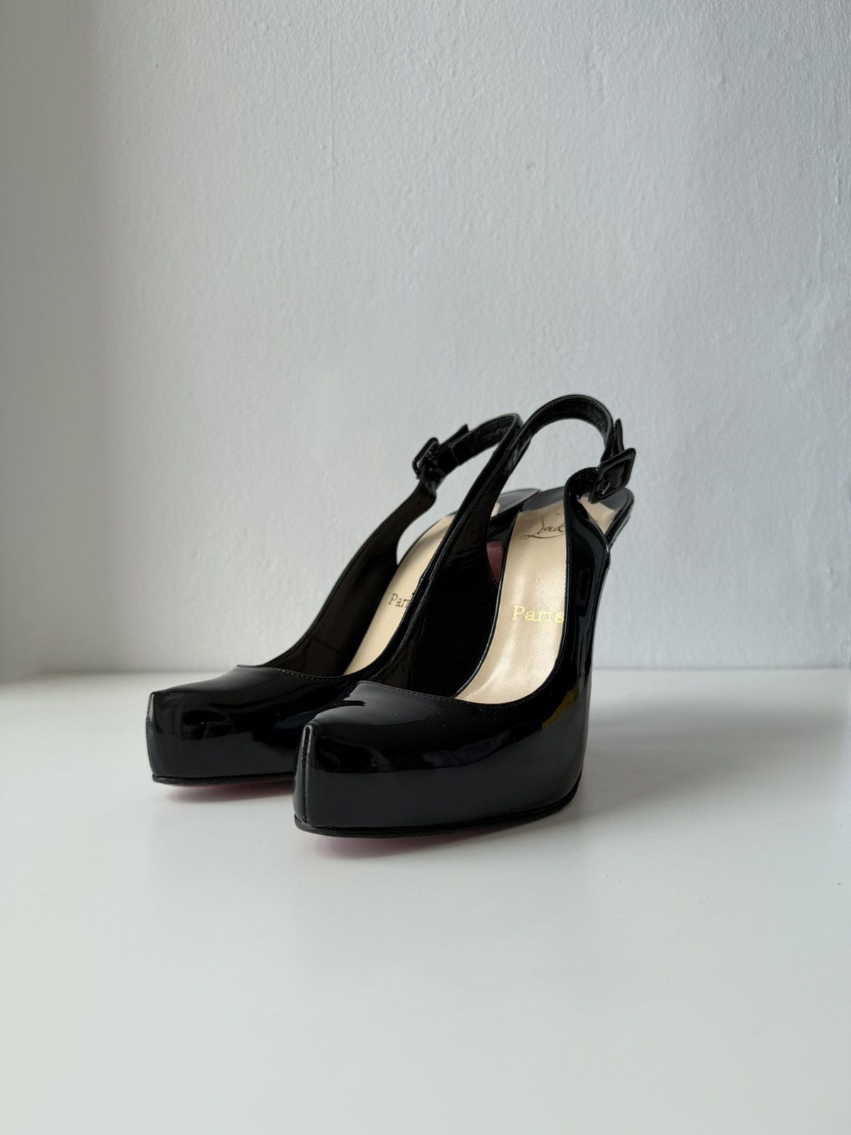 Christian Louboutin Rolande patent leather slingback pumps
