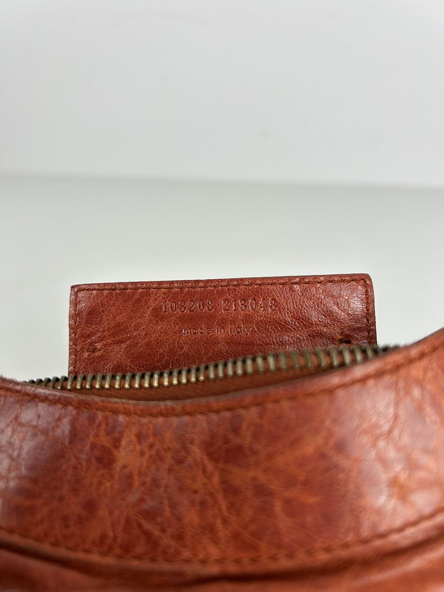 Balenciaga first bag in burnt red