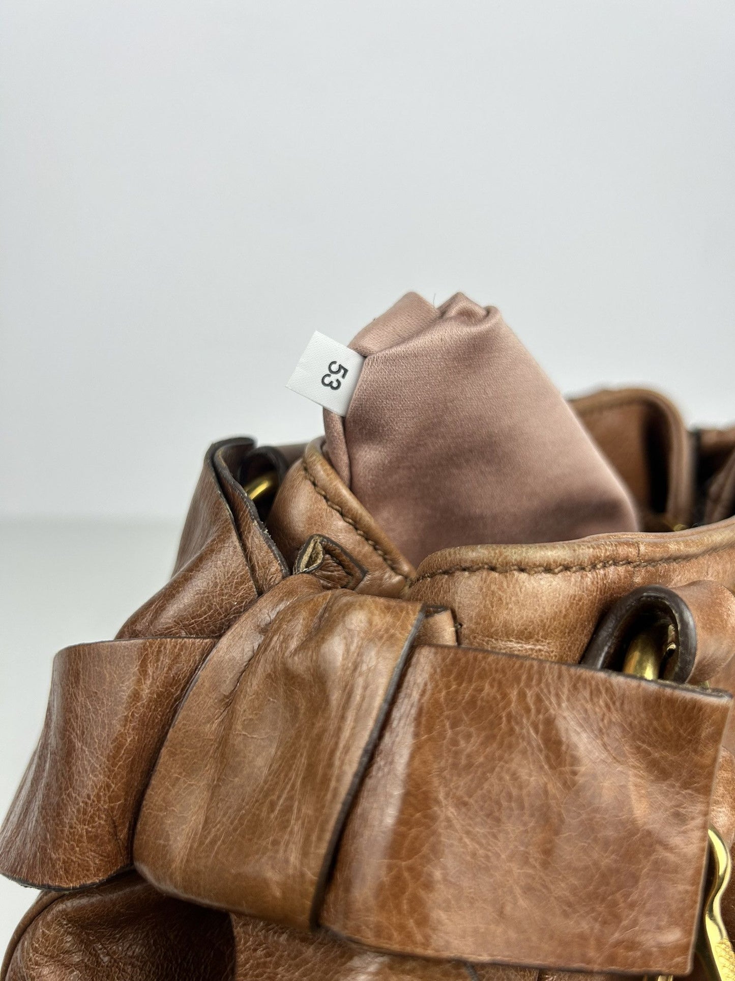 Miu miu mini bow bag in brown