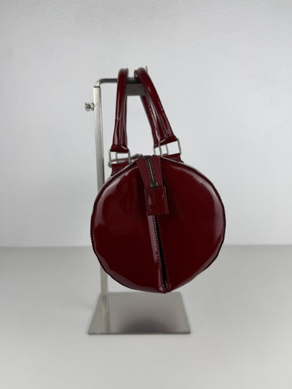 Vintage 90s Miu Miu patent leather cylindrical handbag