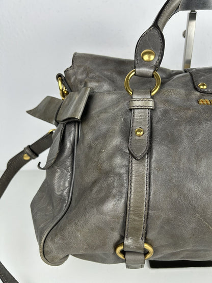Miu miu vitello bow bag in gray with locket
