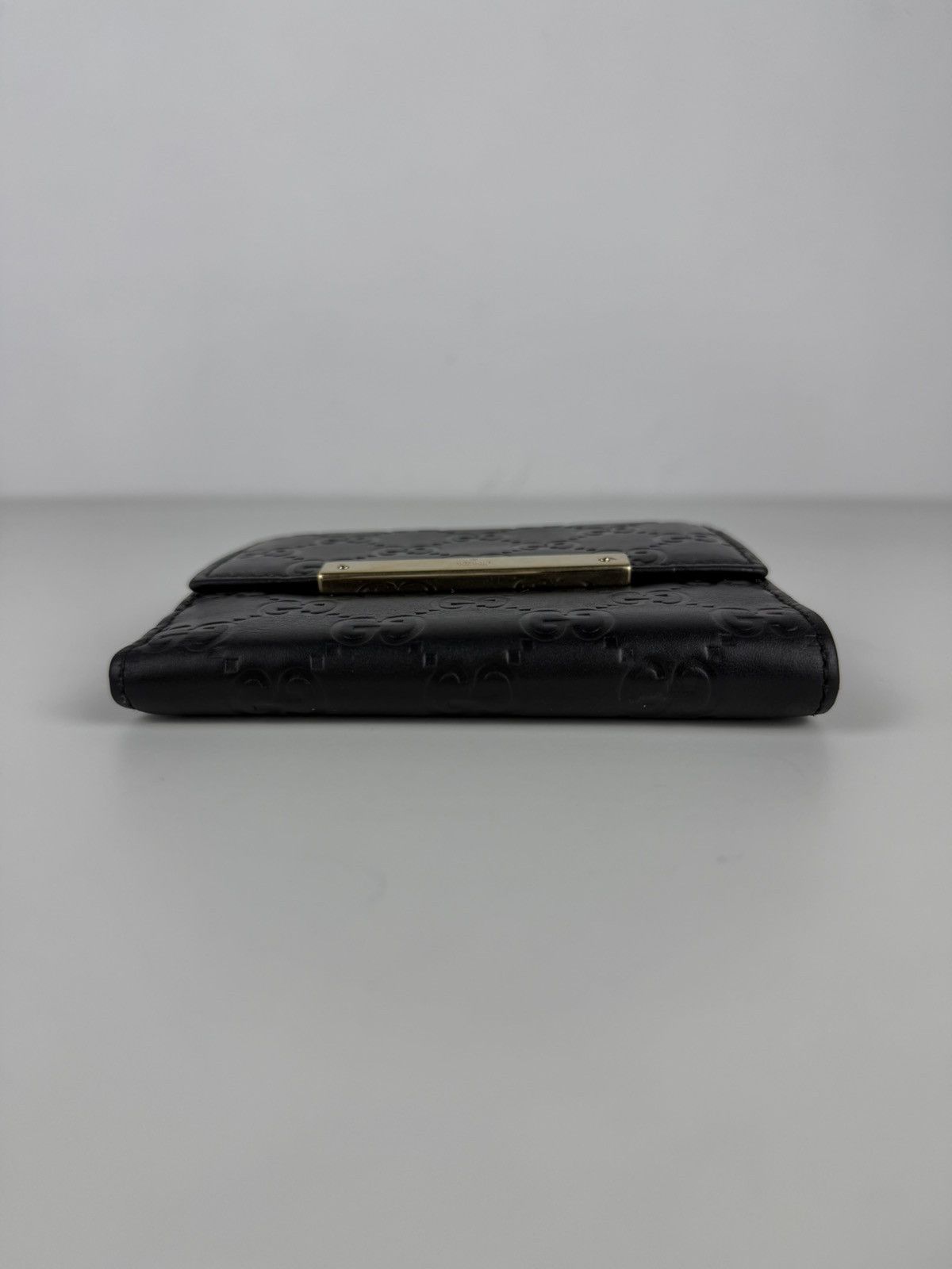 Gucci guccissima leather trifold wallet