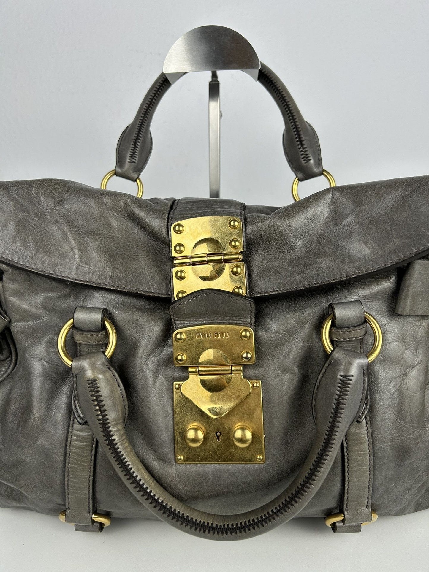 Miu miu vitello bow bag in gray with locket