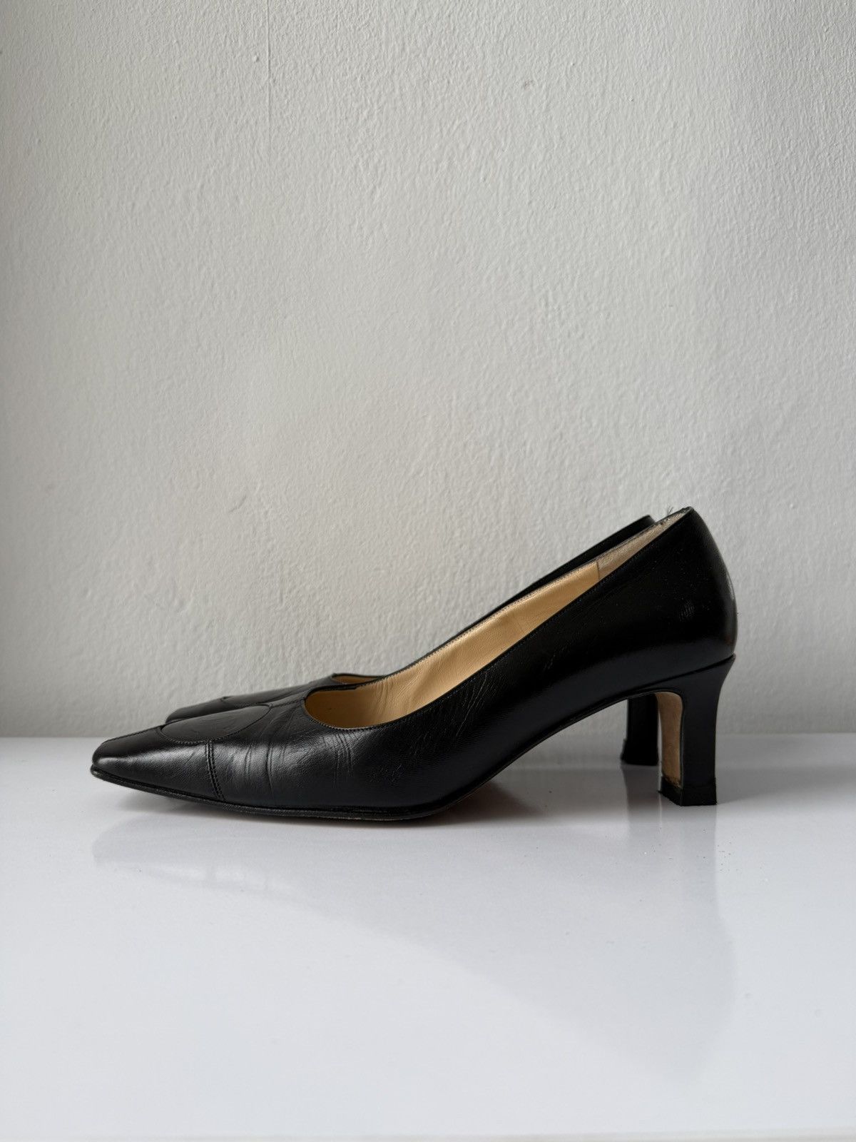 AW2001 Chanel embossed logo long toe leather pumps