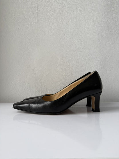 AW2001 Chanel embossed logo long toe leather pumps
