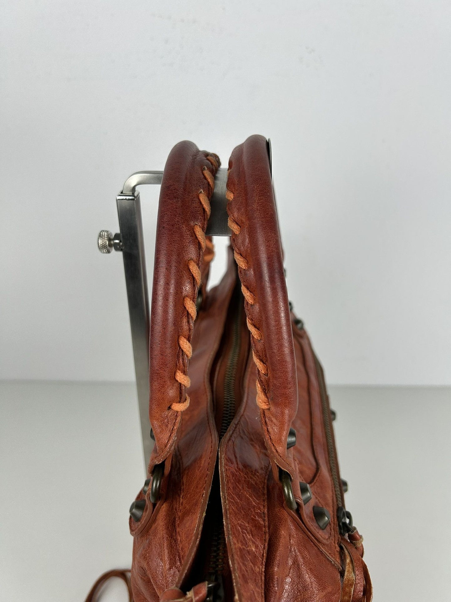 Balenciaga first bag in burnt red