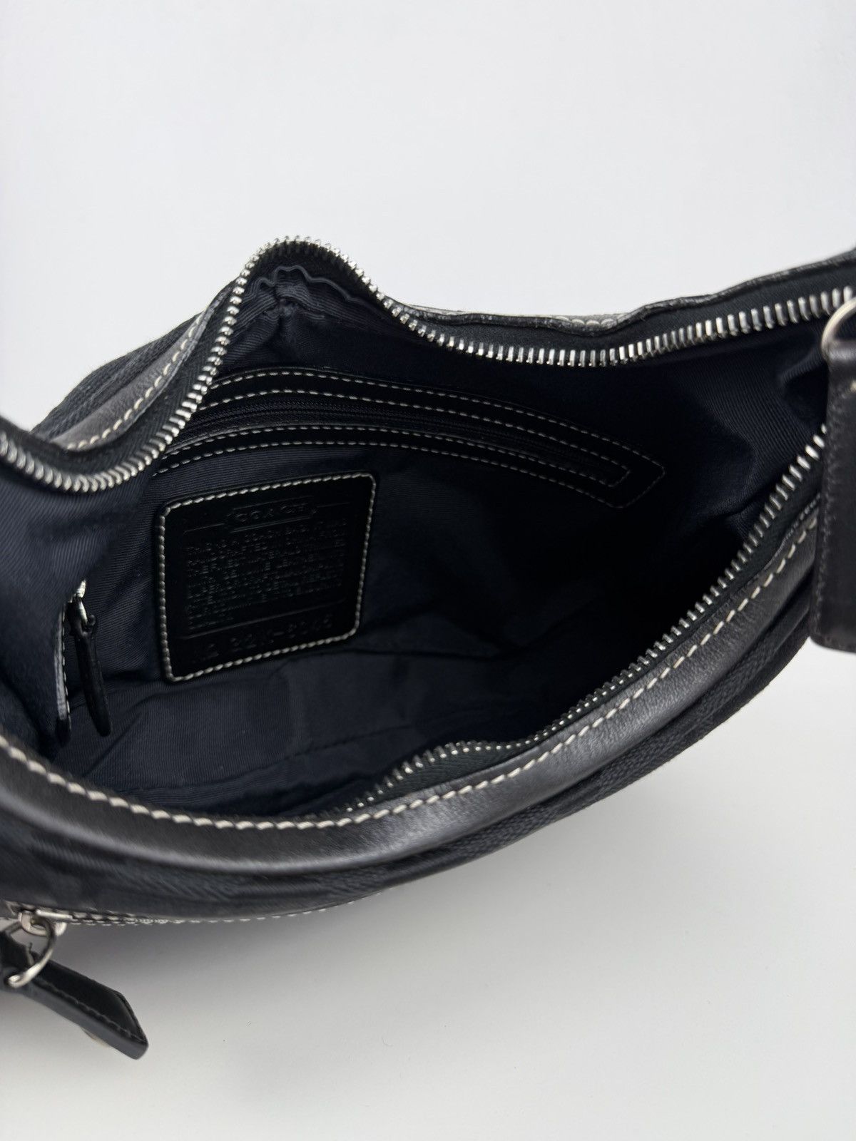 Coach signature jacquard half moon small hobo bag