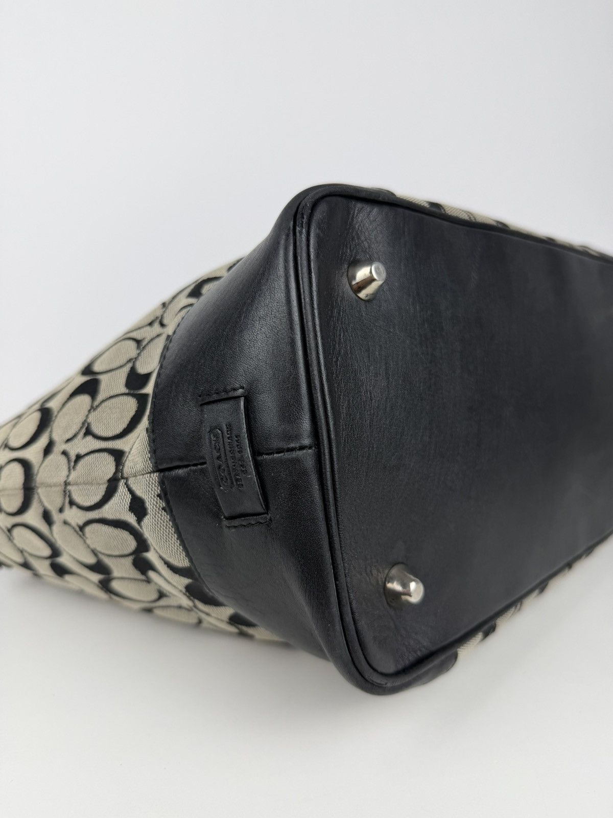 Coach signature leather and canvas tote bag