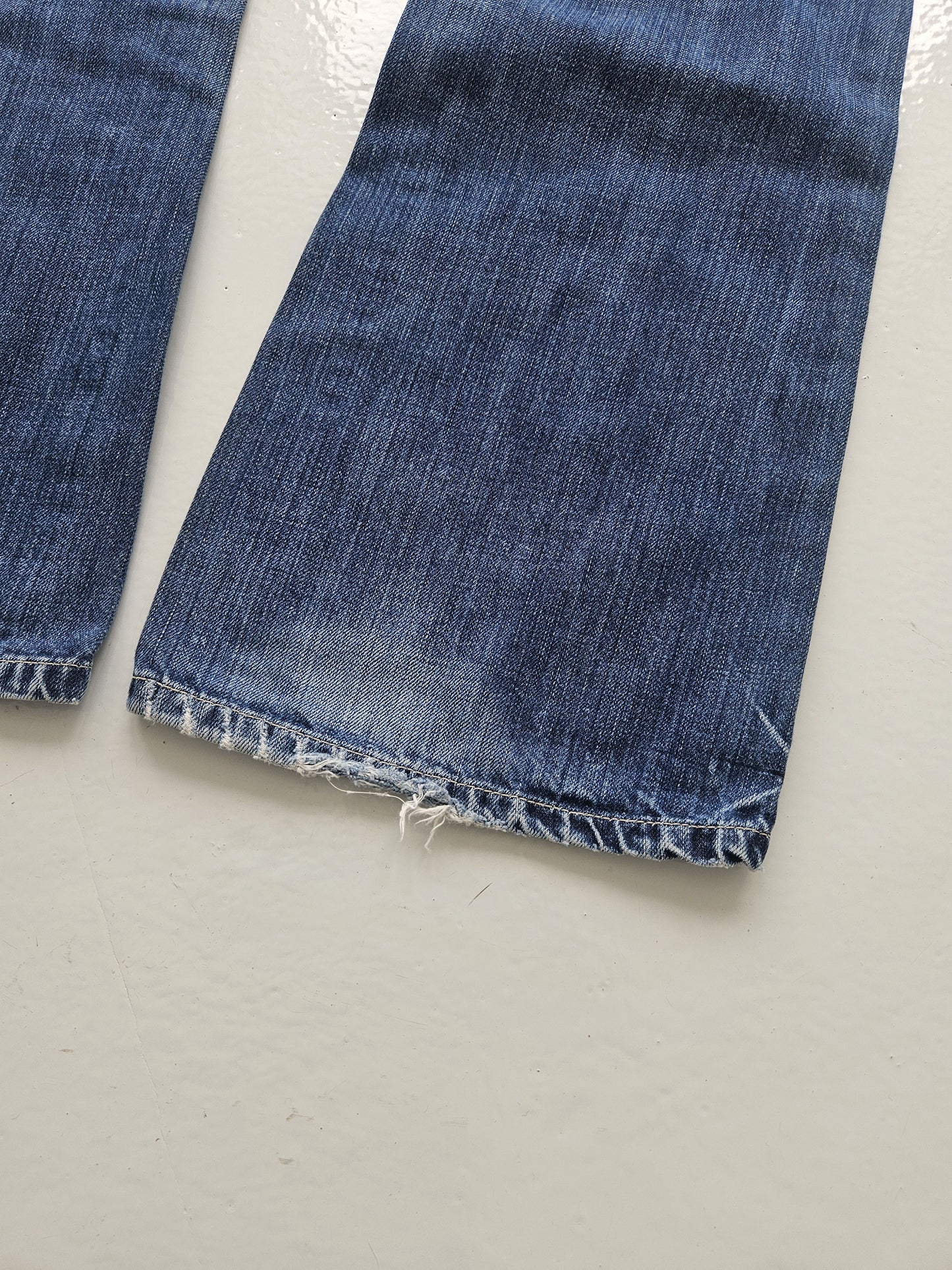 Vintage distressed bootcut low waisted denim