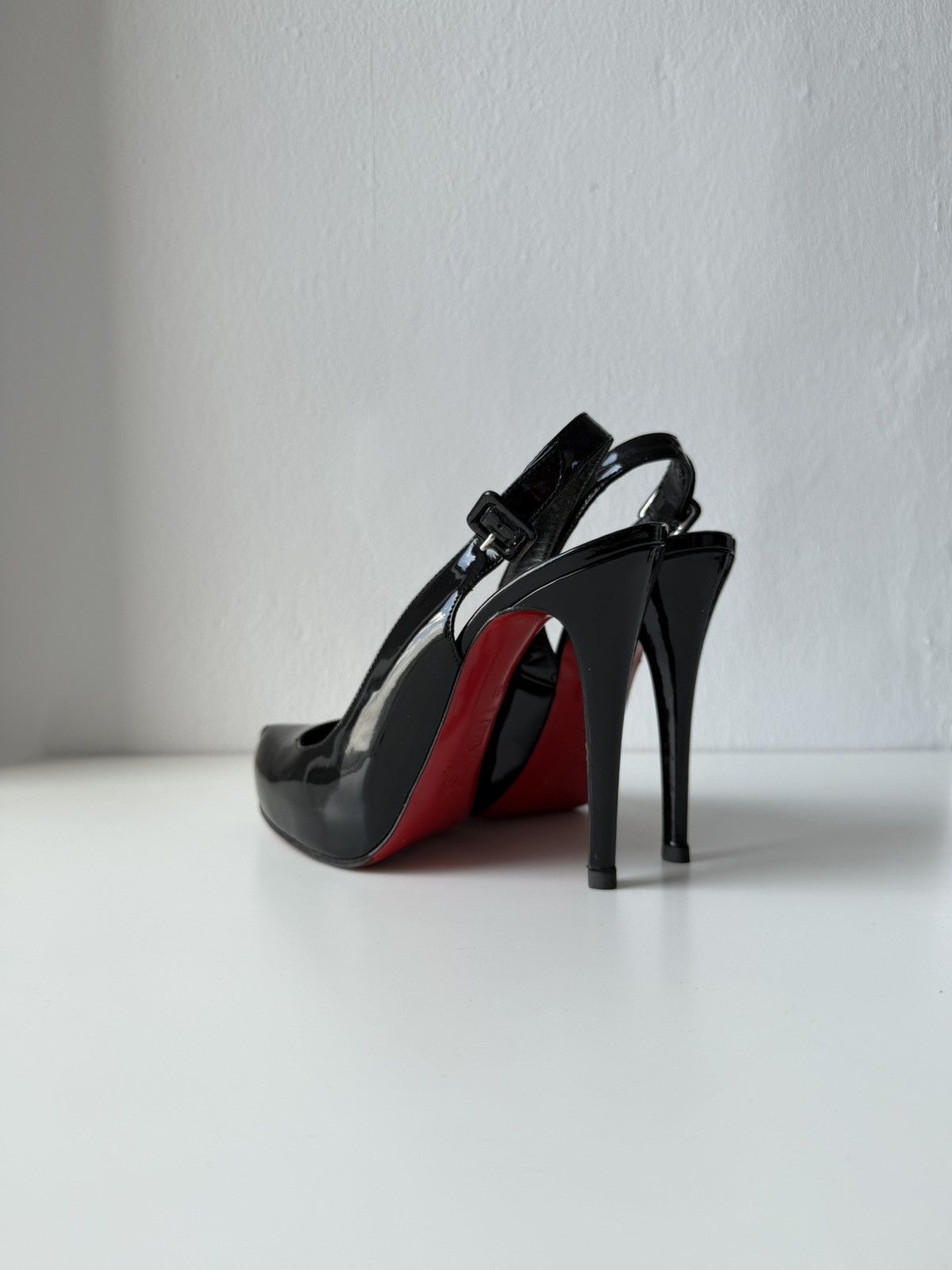 Christian Louboutin Rolande patent leather slingback pumps