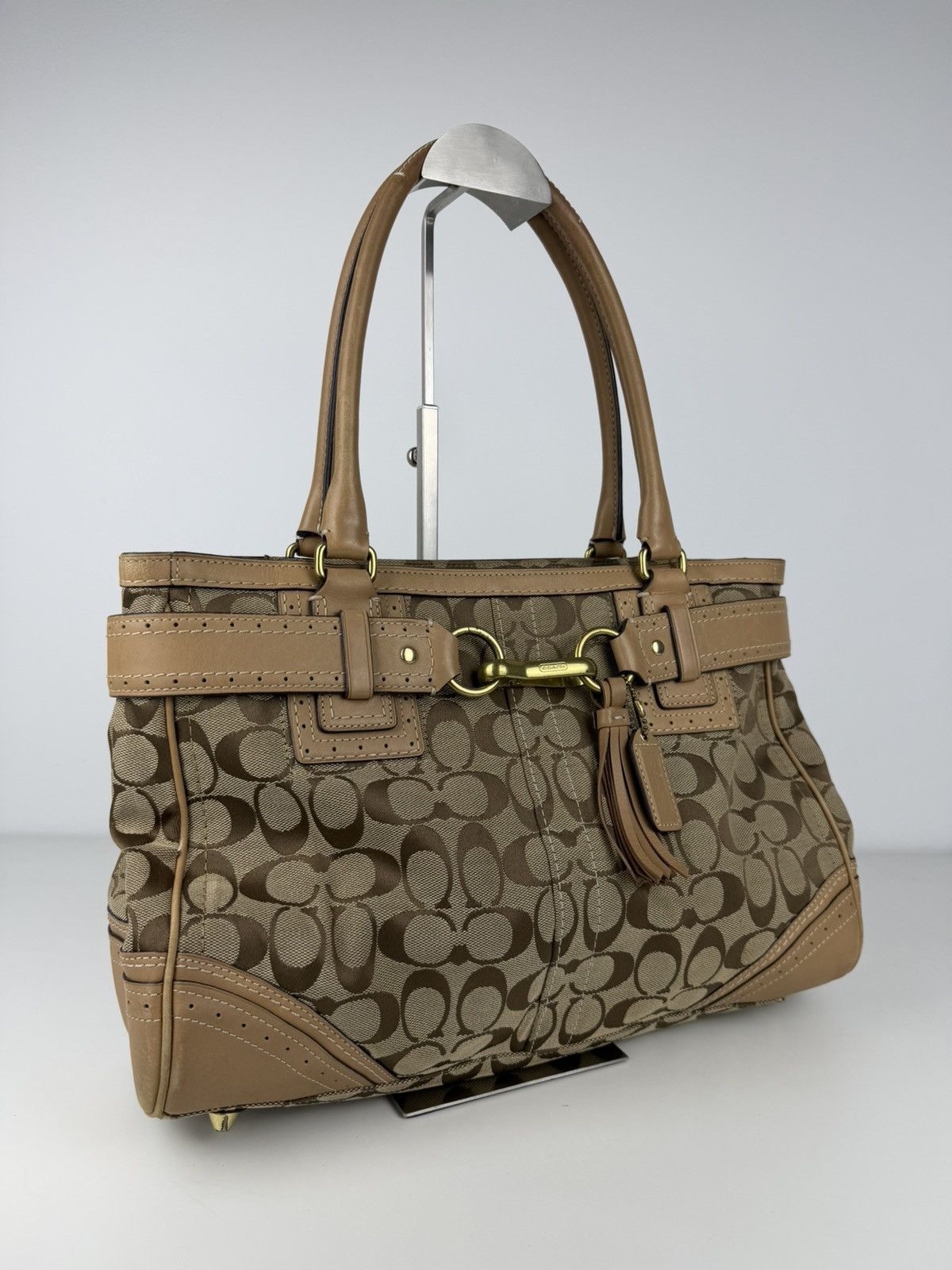 Coach signature leather canvas tassel tote bag