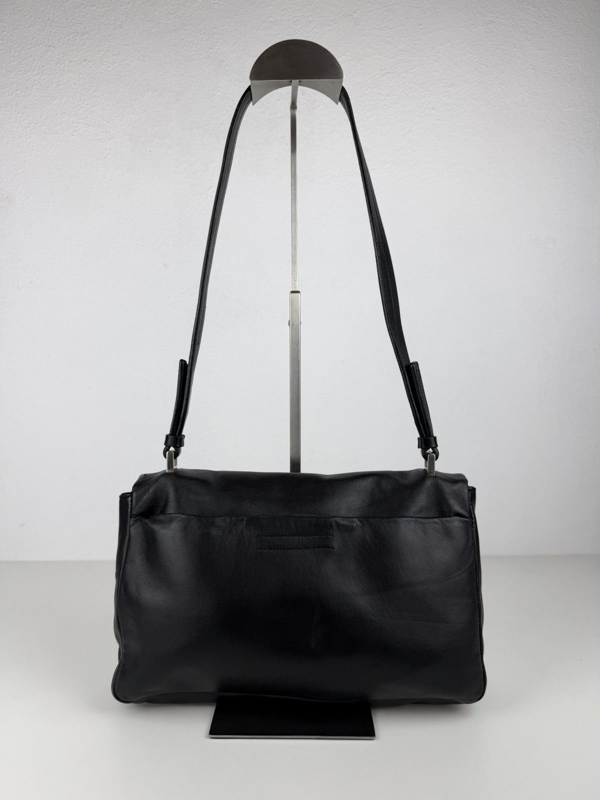 Vintage Prada embossed logo leather shoulder bag
