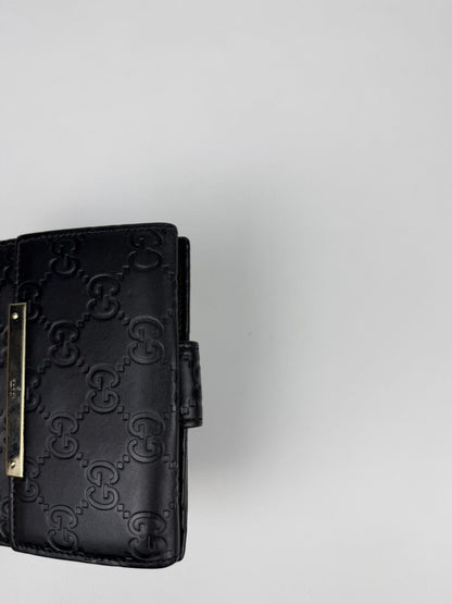 Gucci guccissima leather trifold wallet