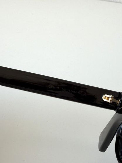 Gucci GG1341O sunglasses with blue tint lenses