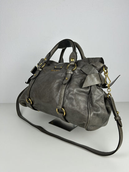 Miu miu vitello bow bag in gray with locket