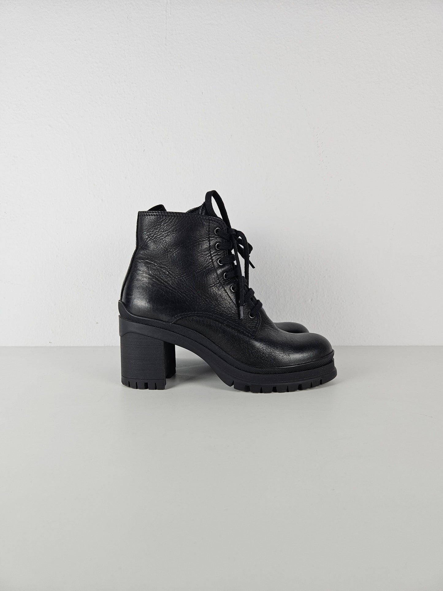 Prada lace up block heel notched sole ankle boots
