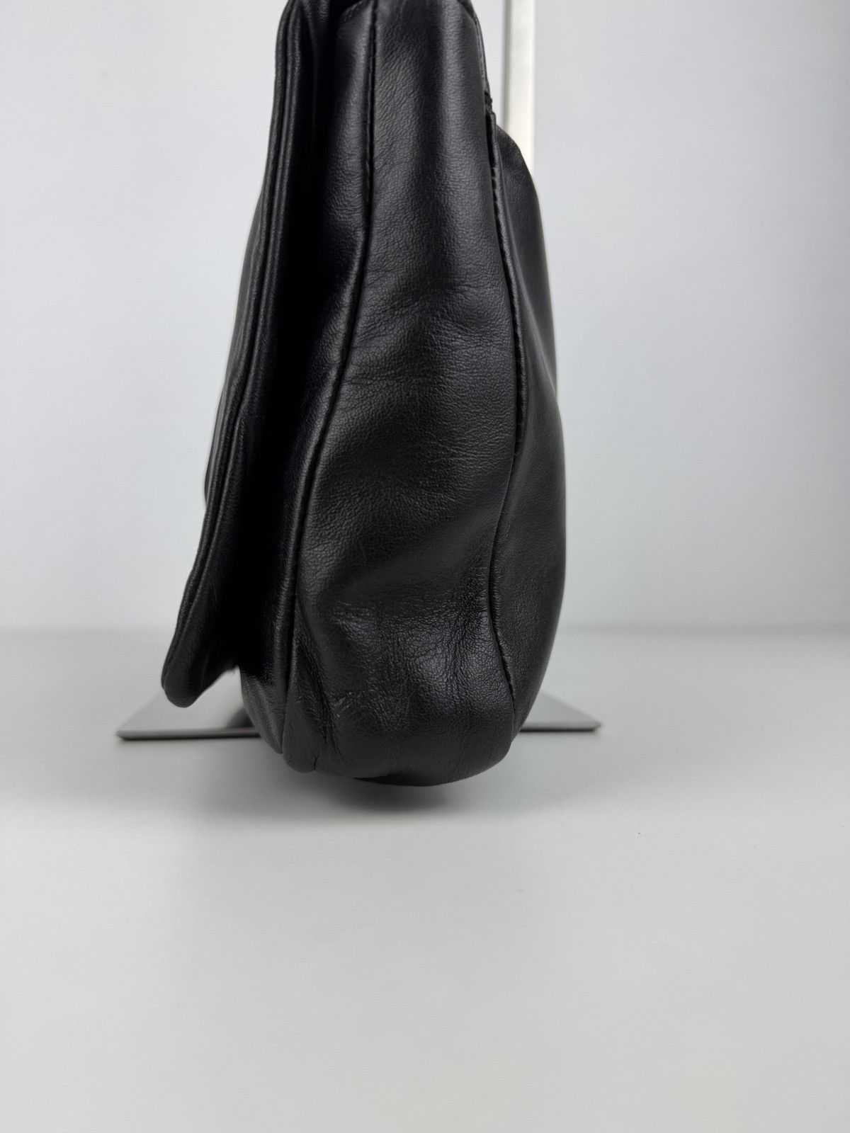 Vintage Prada embossed logo leather shoulder bag